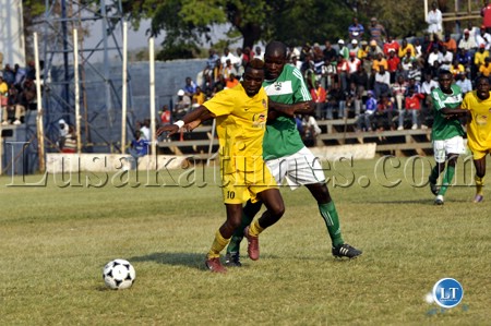 Nchanga Rangers Luka Lungu and Grfeen Buffaloes Joe Lungu fight for the ball during the MTN-FAZ super league match at Woodlands stadium. The teams drew 0-0 Nchanga Rangers Luka Lungu and Grfeen Buffaloes Joe Lungu fight for the ball during the MTN-FAZ super league match at Woodlands stadium. The teams drew 0-0