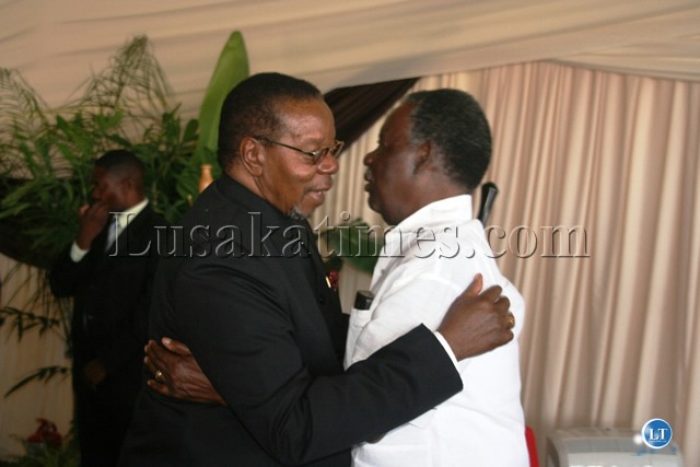 President Sata and his Malawian counterpart Bingu Wa Mutarika embrace each other at Bleomfontein Military Base in South Africa President Sata and his Malawian counterpart Bingu Wa Mutarika embrace each other at Bleomfontein Military Base in South Africa