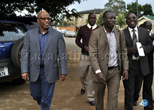 MMD presidential aspirant Dr Nevers (right) and his lawyer Sakwiba Sikota after appearing before investigative wings at the former Taskforce on corruption offices in Lusaka.