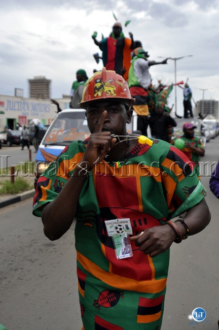 A soccer fan shows the Patrotic Front 'donchi kubeba' symbol in support of the Zambia National Soccer team in Lusaka.
