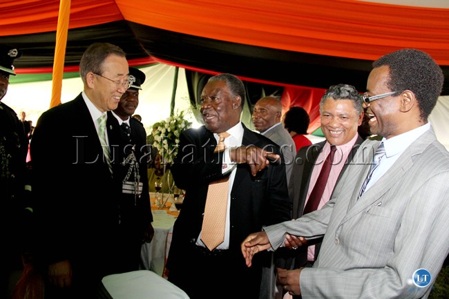 Ban Ki Moon, Former Vice President George Kunda and President Michael Sata share a light moment at State House while Given Lubinda looks on1 Ban Ki Moon, Former Vice President George Kunda and President Michael Sata share a light moment at State House while Given Lubinda looks on1