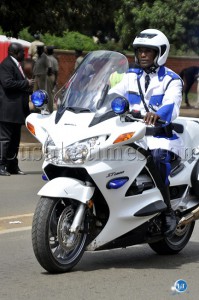 A traffic police officer on motor bike