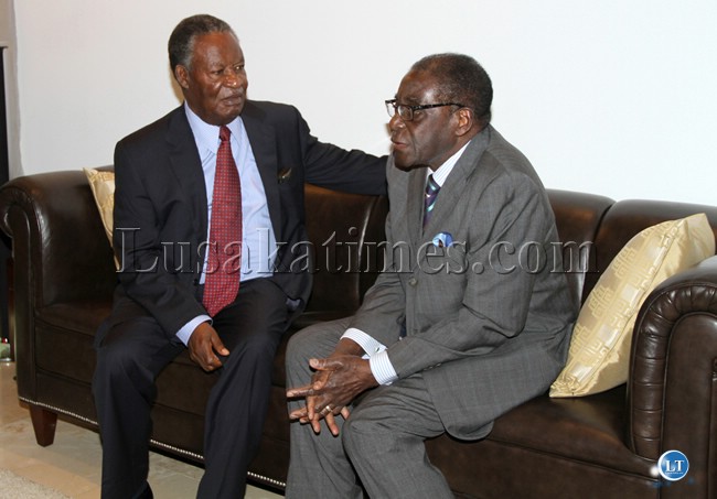 FILE: President Sata and President Mugabe