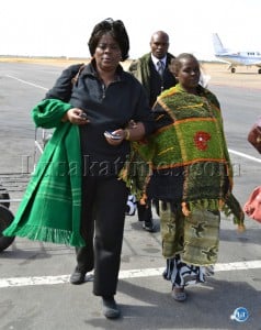 Community Development, Mother and Child Health Deputy Minister Jean Kapata (l) arrives at Kenneth Kaunda International Airport in Lusaka with Florence Mampa who has been evacuated to University Teaching Hospital for medical attention Community Development, Mother and Child Health Deputy Minister Jean Kapata (l) arrives at Kenneth Kaunda International Airport in Lusaka with Florence Mampa who has been evacuated to University Teaching Hospital for medical attention