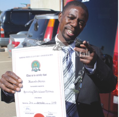 FILE: MMD Mufumbwe Member of Parliament Steven Masumba showing his diploma to the media FILE: MMD Mufumbwe Member of Parliament Steven Masumba showing his diploma to the media