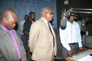 Information and Broadcasting Deputy Minister, Mwansa Kapeya (c) in one of the studios at Radio Maria-Zambia in Chipata