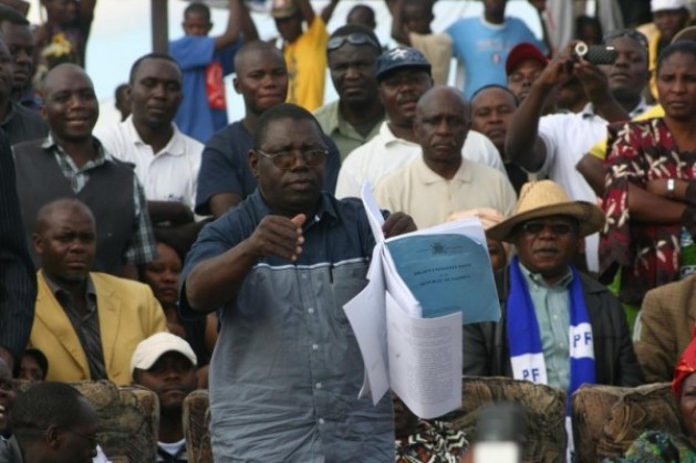 Sam Mukupa tearing draft constitution produced by the MMD Government last year at a Political rally Sam Mukupa tearing draft constitution produced by the MMD Government last year at a Political rally