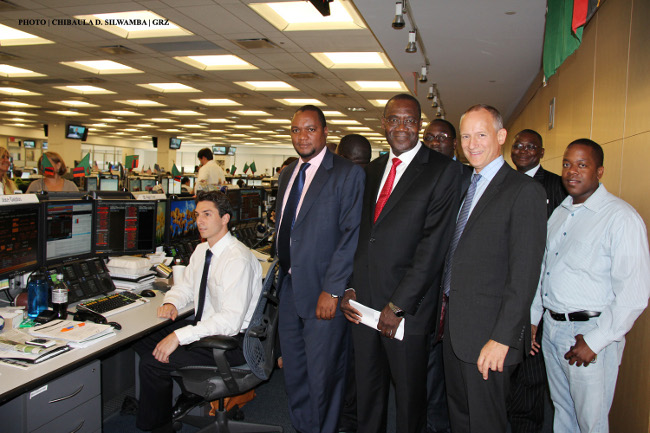 (Left to right) Deutsche Bank head of Emerging Markets Department syndicate Dennis Eisele, Finance Deputy Minister Miles Sampa, Bank of Zambia Deputy Governor Dr Bwalya Ng?andu, Deutsche Bank head of bond syndicate Nigel Cree and other officials from Zambia, Barclays Bank and Deutsche Bank and Barclays Bank Zambia head of structured finance Chungu Kaunda celebrate after the launch of Zambia?s US$750million-worth bond on Wall Street in New York on Thursday 13 September, 2012. PHOTO | CHIBAULA D. SILWAMBA | GRZ (Left to right) Deutsche Bank head of Emerging Markets Department syndicate Dennis Eisele, Finance Deputy Minister Miles Sampa, Bank of Zambia Deputy Governor Dr Bwalya Ng?andu, Deutsche Bank head of bond syndicate Nigel Cree and other officials from Zambia, Barclays Bank and Deutsche Bank and Barclays Bank Zambia head of structured finance Chungu Kaunda celebrate after the launch of Zambia?s US$750million-worth bond on Wall Street in New York on Thursday 13 September, 2012. PHOTO | CHIBAULA D. SILWAMBA | GRZ