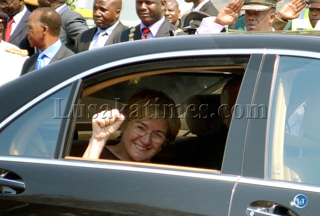 Wife of Vice President Guy Scott, Charlotte, shakes the popular Patriotic Front symbol of a clenched fist at members of the public as she was driven away from the Freedom Statue Wife of Vice President Guy Scott, Charlotte, shakes the popular Patriotic Front symbol of a clenched fist at members of the public as she was driven away from the Freedom Statue