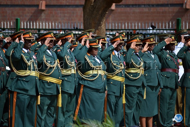 President Michael Sata is welcomed by service chiefs on arrival at the at the Freedom Statue President Michael Sata is welcomed by service chiefs on arrival at the at the Freedom Statue