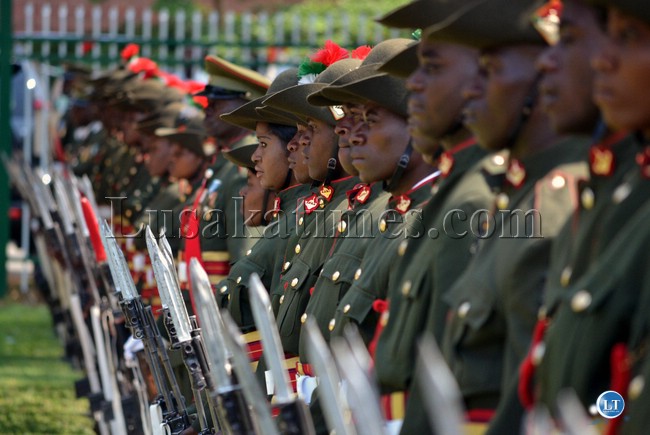 Troops with drawn bayonets on parade at the Freedom Statue. Troops with drawn bayonets on parade at the Freedom Statue.