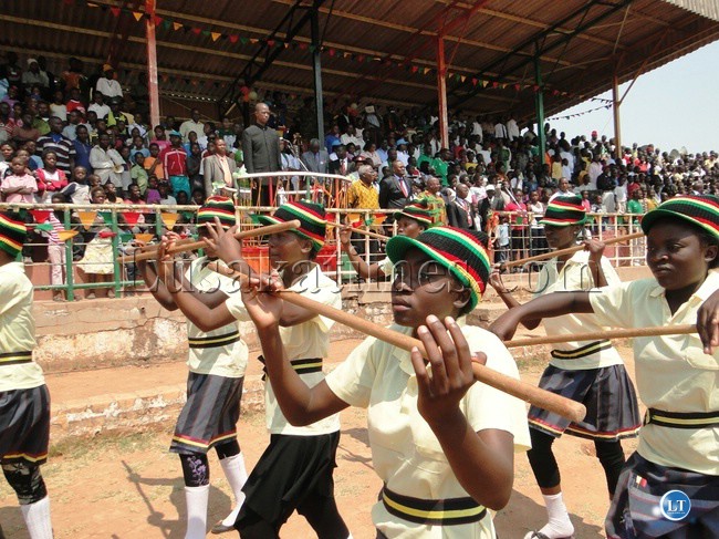 Home Affairs Minister Edgar Lungu looks at the Majorettes s as they salute him at Kasama sports Stadium where he officiated at this year‘s Independence Day commemoration. Hundreds of Kasama Residents turned up for the day Home Affairs Minister Edgar Lungu looks at the Majorettes s as they salute him at Kasama sports Stadium where he officiated at this year‘s Independence Day commemoration. Hundreds of Kasama Residents turned up for the day