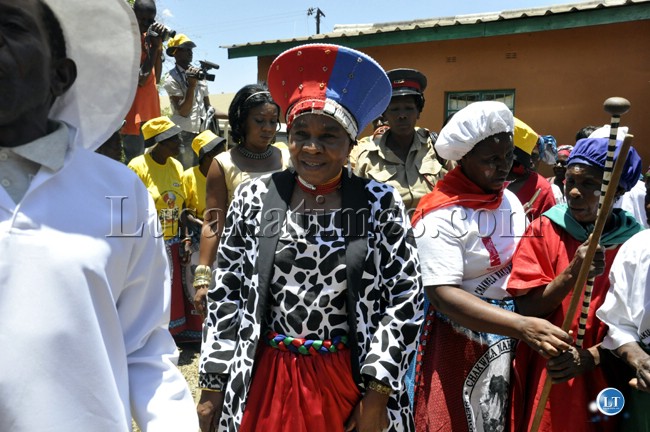 Chieftainess Nkomeshya emerges from her palace to grace the Chakwela Makumbi traditional ceremony