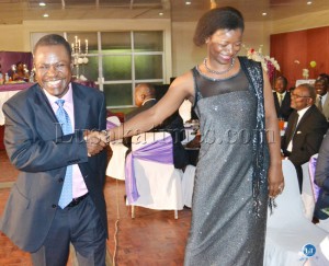 Justice Minister Wynter Kabimba (left) with MMD Mafinga Member of Parliament Catherine Namugala during a wedding reception of Choombwa Chilikwela who married Twivwa Namugala in Lusaka at the weekend.