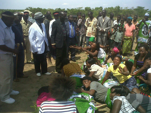 Mpezeni being welcomed in style by some bemba women while chief chewe in white jacket looks on at the airstrip in chinsala Mpezeni being welcomed in style by some bemba women while chief chewe in white jacket looks on at the airstrip in chinsala