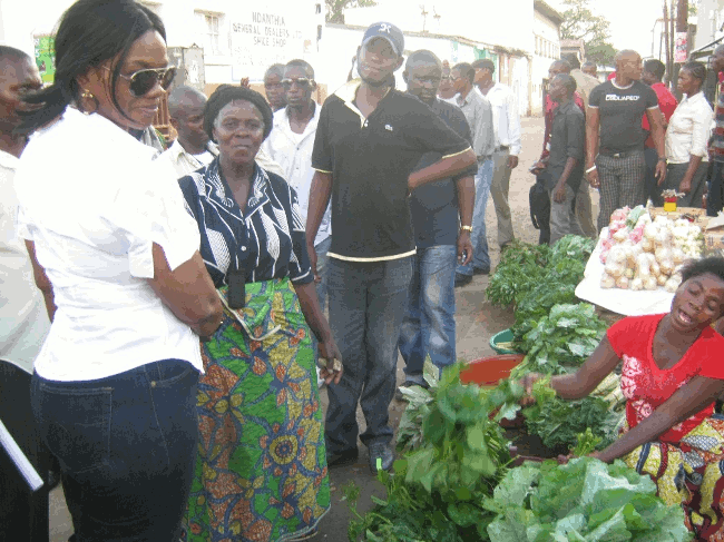 Tourism and Arts minister Sylvia Masebo (left) greet vegetable vendors opposite Shoprite town centre outlet in Livingstone Tourism and Arts minister Sylvia Masebo (left) greet vegetable vendors opposite Shoprite town centre outlet in Livingstone