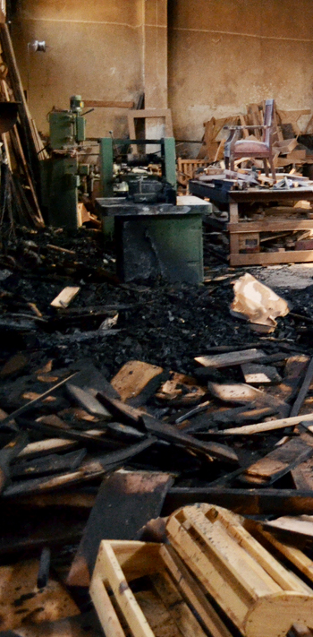 Gutted machinery and materials at Decormore Investments, a furniture making factory, in Lusaka Gutted machinery and materials at Decormore Investments, a furniture making factory, in Lusaka
