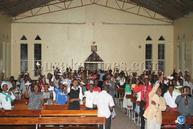 CONGREGANTS with their lit candles during a candle light inter-faith service held at Reformed Church in Zambia (RCZ) in Chipata CONGREGANTS with their lit candles during a candle light inter-faith service held at Reformed Church in Zambia (RCZ) in Chipata