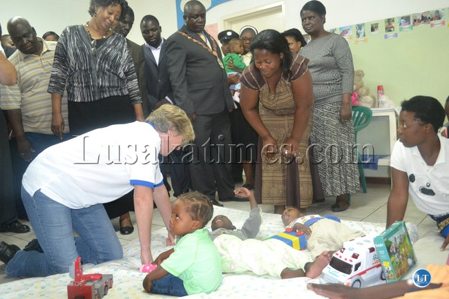 Wife of Vice President Guy Scott taking time to Interact with kids Wife of Vice President Guy Scott taking time to Interact with kids