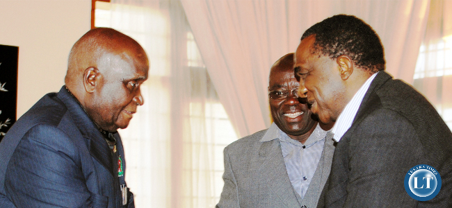 First Republican President Kenneth Kaunda with founder members of the opposition MMD Christopher Ngoma (right) and former minister and permanent secretary in the MMD regime Jazzman Chikwakwa (centre) when they announced their defection