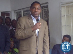Hakainde Hichilema addressing the media