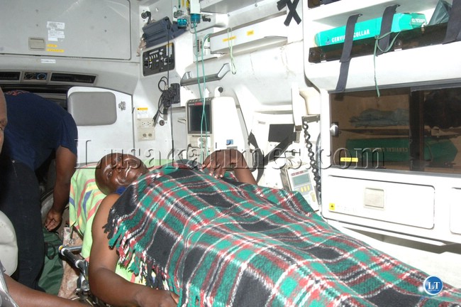 Mwame Bus Services was travelling from Luapula to Lusaka when it overturned last week on Wednesday night killing one person on the spot and left 47 others hospitalized. Here, Kizito Kaseketi being evacuated Mwame Bus Services was travelling from Luapula to Lusaka when it overturned last week on Wednesday night killing one person on the spot and left 47 others hospitalized. Here, Kizito Kaseketi being evacuated