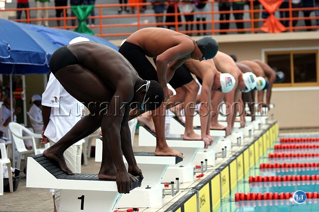 SADC Zone Six Under 20 swimmers about to dive into the pool at the Olympic Youth Development Centre in Lusaka.