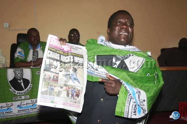 PETER Nyirenda, who was District Commissioner in the MMD government, displays a Post Newspapers showing images of former MMD National Secretary, Major Richard Kachingwe, being dragged by MMD youth after addressing a press conference in last month. PETER Nyirenda, who was District Commissioner in the MMD government, displays a Post Newspapers showing images of former MMD National Secretary, Major Richard Kachingwe, being dragged by MMD youth after addressing a press conference in last month.