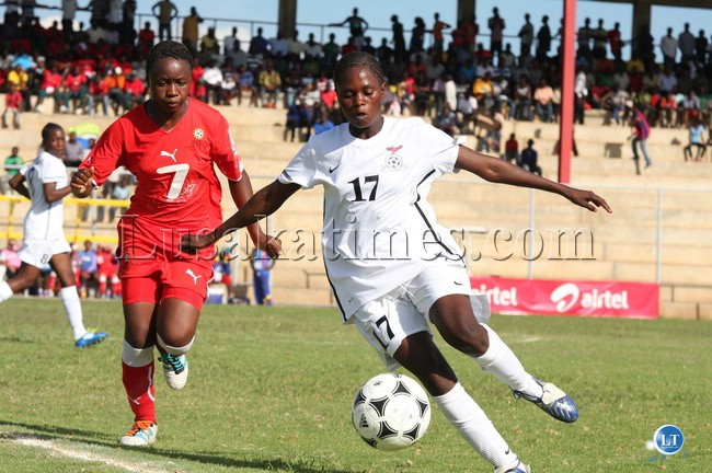 macleane daka 17 of zambia negociate with depney nowabes of namibia 7.at sunset stadium