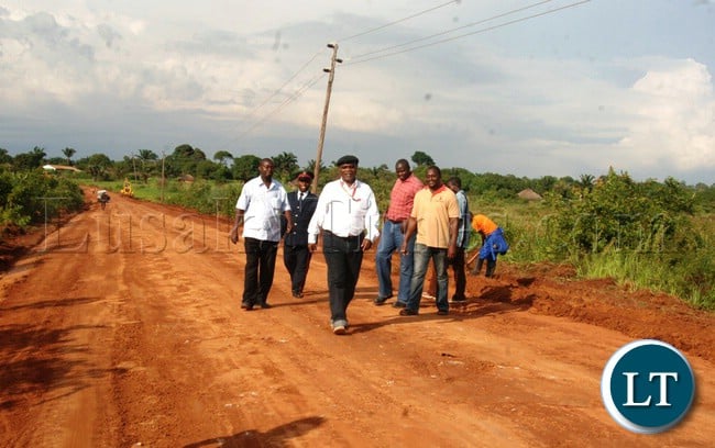 Road Development Agency ( RDA) has alocated 1.3 Billion Kwacha (un rebased currency) for the rehabilitation and grading of the Kashikishi- Lunchinda road in Luapula Province and the works on the road has since been started. Here, Luapula Province Minister Benson Kapaya leading Provincsil officers from RDA,Rural Roads Unit and Physcal Planning Unit when he inspected the project. Road Development Agency ( RDA) has alocated 1.3 Billion Kwacha (un rebased currency) for the rehabilitation and grading of the Kashikishi- Lunchinda road in Luapula Province and the works on the road has since been started. Here, Luapula Province Minister Benson Kapaya leading Provincsil officers from RDA,Rural Roads Unit and Physcal Planning Unit when he inspected the project.