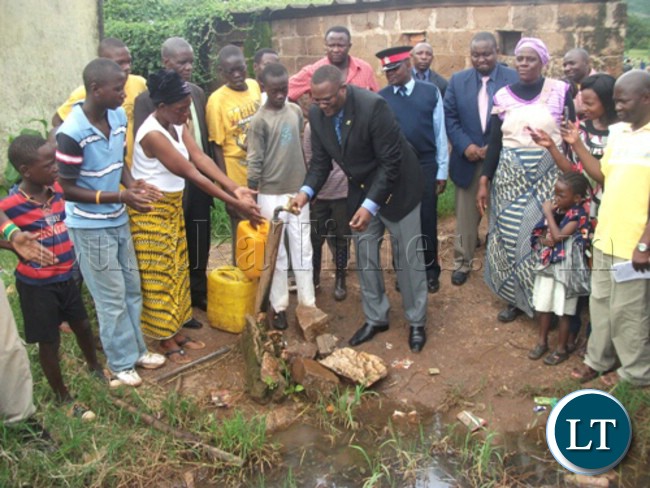 Eastern Province Permanent Secretary Emmanuel Mwamba washing his hands during the tour of Saturday Market in Chipata
