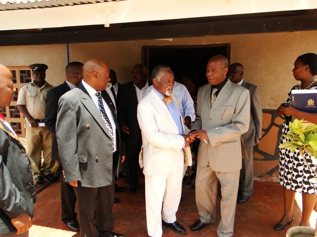 NORTHERN Provincial Minister Col. Gerry Chanda second (right) shaking hands with National Technical Committee team leader to Northern Provincial Constitution Conference Dr. Rodger Chonwe outside the conference hall at Nellas Lodge in Kasama after the official opening NORTHERN Provincial Minister Col. Gerry Chanda second (right) shaking hands with National Technical Committee team leader to Northern Provincial Constitution Conference Dr. Rodger Chonwe outside the conference hall at Nellas Lodge in Kasama after the official opening