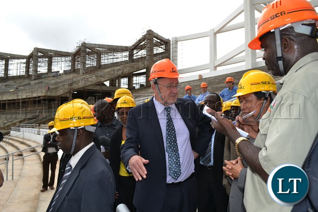 VICE President Guy Scott with Chinese Ambassador Zhou Yu Xzao when he toured the Lusaka Stadium