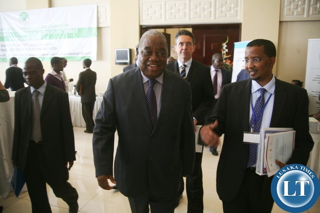 Left to right, Former Zambian President Rupiah Banda, Swedish Ambassador to Kenya Joan Borgstam and Independent Electoral and Boundaries Commission chairman Ahmed Hassan leave the hall after opening the two-day conference on the Kenya 2013 elections.