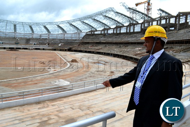 FINANCE and National Planning Deputy Minister and also Matero Member of Parliament, Miles Sampa, admiring the construction works going on at the Lusaka Stadium