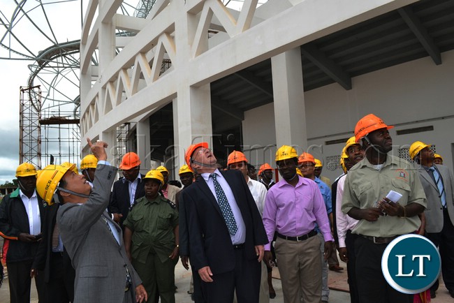 REPUBLICAN Vice President Guy Scott and Chinese Ambassador Zhou Yu Xzao admire construction works at the Lusaka Stadium