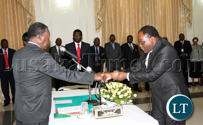 President Micheal Sata has advised politicians in the country to desist from practicing politics of violence,Picture the president during the Swearing in of Dr Roland Msiska Secretary to the Cabinet at Statehouse 27-02-2013- picture by Eddie Mwanaleza/Statehouse.