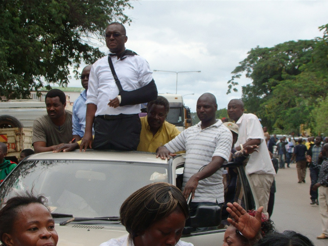 MAZABUKA Central Member of Parliament Garry Nkombo (with arm band) and seven others took to the streets with UPND supporters in celebration over the discontinuation of the case and walk to freedom in Livingstone