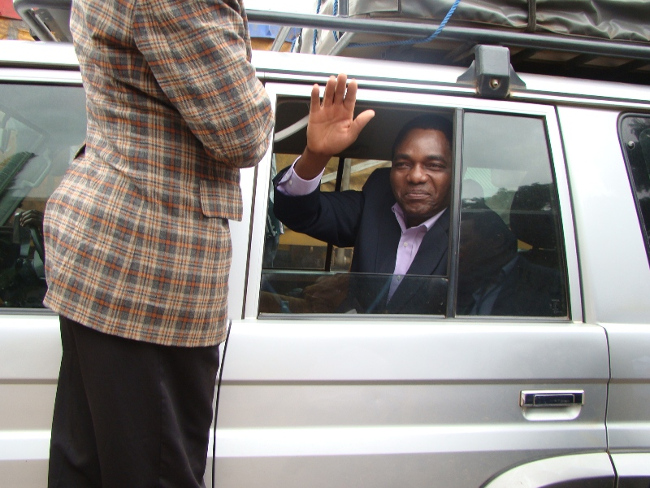 UNITED Party for National Development (UPND) leader Hakainde Hichilema waves at by standers (not in picture) after Mazabuka Central Member of Parliament Garry Nkombo and seven others were set free by the magistrate court in Livingstone