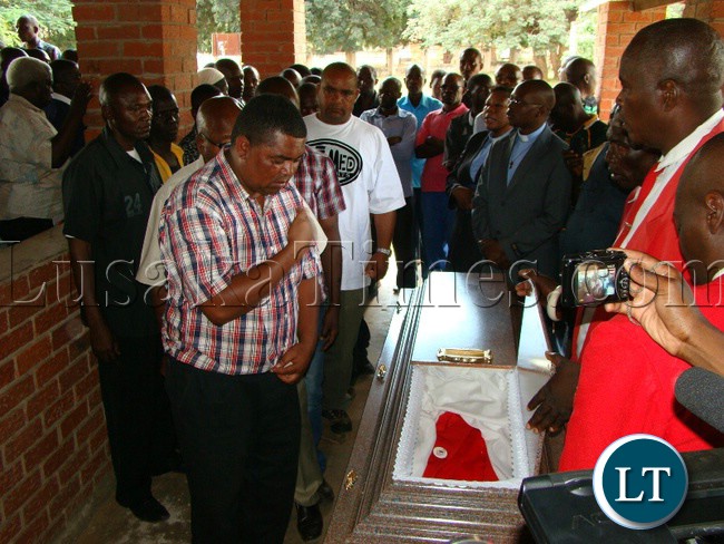 PATRIOTIC Front Campaign Manager Obvious Mwaliteta pays last respect to late Monze District Secretary Harrison Chanda suspected to be murdered during political campaigns at Livingstone general hospital