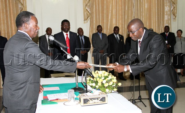 President Micheal Sata has advised politicians in the country to desist from practicing politics of violence,Picture the president during the Swearing in of Mr Robert Kamalata as Senior Private Secretary (SPS) in the office of the Vice President at Statehouse 27-02-2013- picture by Eddie Mwanaleza/Statehouse.