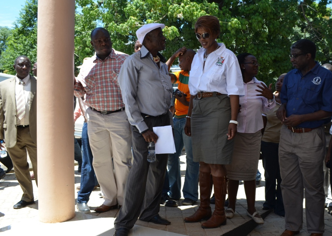 Tourism Minister Sylvia Masebo (middle) speak to Senior Chief Mukuni (next to her) as Information and Broadcasting Permanent Secretary Amos Malupenga (left) look on