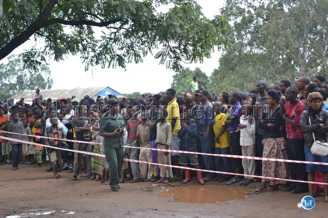 Police seal off the accident scene from members of the public.