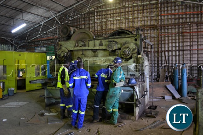 Workers at Nitrogen Chemicals of Zambia in Kafue manufacturing equipment parts in the fabrication workshop