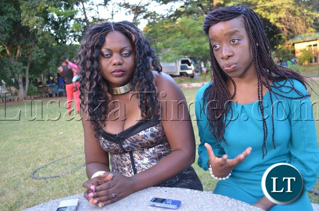 Musicians Saboi Imboela (left) and Tasila Mwale (right) at Mukuni Park in Livingstone