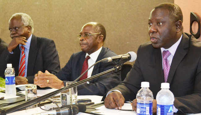 FORMER Zambia Railways Limited board vice chairperson Professor Oliver Saasa (right) flanked by Chairperson Mark Chona (middle) and board member Geoffrey Mulenga addresses journalists