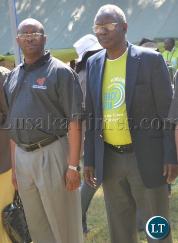 Health Minister Joseph Kasonde (right) and Zimbabwe Deputy Minister of Health and Child Welfare Douglas Mombeshora (left) being saluted participants (not in picture) during the World Malaria Day celebrations at Mukuni Park in Livingstone