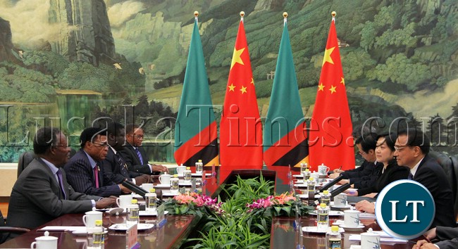 President Micheal Sata holding Face To Face official talks with Chinese Premier In China Chinese Premier Li Keqiang holding Official talks with Zambian President Michael Sata government delegation at the Great hall of the people in Fujian Room in Beijing China on wednesday 10th April 2013- Picture By Eddie Mwanaleza/Statehouse.