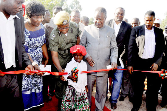 Nalolo' s Wamunyima Mukubesa cuts a ribbon during the launch of the Muoyo Water Supply scheme project by President Michael Sata in Nalolo, Western Province on April 19,2013-Picture by THOMAS NSAMA