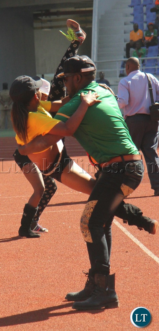 JK and his dancing queens at Levy Mwanawasa stadium during Zambia vs Lesotho game. Picture by Jean Mandela
